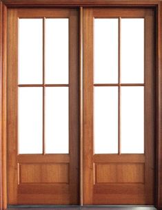 a wooden door with two glass panels