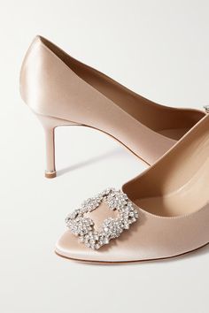 MANOLO BLAHNIK Hangisi 70 crystal-embellished satin pumps | NET-A-PORTER Silk Heels For Gala, Elegant Silk Heels Fitted, Luxury Embellished Wedding Shoes, Elegant Fitted Silk Heels, Fitted Silk Elegant Heels, Luxury Embellished Heels For Reception, Elegant Champagne Heels For Reception, Elegant Embellished Shoe Clips For Evening, Luxury Heels For Reception