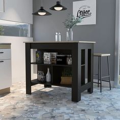 a kitchen with an island and stools in it