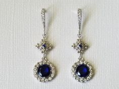 Navy Blue Crystal Earrings, Blue Silver Earrings, Blue Chandelier Earrings, Blue Cubic Zirconia Bridal Earrings, Wedding Navy Blue Jewelry Formal Blue Dangle Bridal Earrings, Blue Dangle Bridal Earrings For Formal Occasions, Blue Crystal Drop Earrings For Formal Occasions, Blue Drop Earrings For Bridal Formal Occasion, Blue Drop Earrings For Formal Bridal Wear, Blue Dangle Crystal Earrings For Formal Occasions, Blue Bridal Earrings For Formal Occasions, Blue Round Chandelier Earrings For Party, Blue Round Bridal Earrings For Formal Occasions