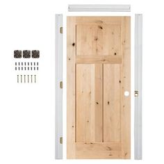 a wooden door with screws and nails on the bottom half, next to it