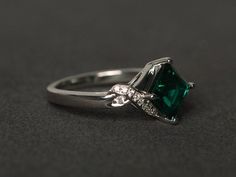 Welcome to my shop, you can find many beautiful gemstone jewelry here, and you also can ask for customized service. Main Stone: lab emerald, square cut, measures 7x7mm, weights about 1.62 caratsAccent Stones: czMetal: 925 sterling silver plated with rhodium. I also can provide metal options such as 14k solid yellow/white/rose goldSetting: prong settingmore rings: https://www.etsy.com/shop/XCjewelryStudio?ref=hdr_shop_menuIt's a perfect gift for the person who was born in May (Birthstone), it's q Silver And Emerald Jewelry, Emerald Solitaire Ring For Promise, Green Emerald Ring With Center Stone For Promise, Green Emerald Promise Ring With Center Stone, Emerald Cut Promise Ring In Emerald, Emerald Princess Cut Ring With Prong Setting, Sterling Silver Emerald Promise Ring For May Birthstone, Emerald Birthstone Diamond Promise Ring, Sterling Silver Emerald Promise Ring