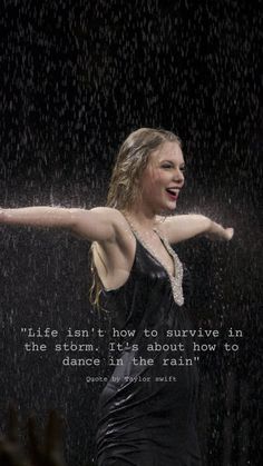 a woman is dancing in the rain with her arms spread out and there is a quote on it