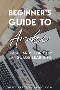 an open laptop computer sitting on top of a wooden table with the title beginner's guide to arabic flashcards for easy language learning