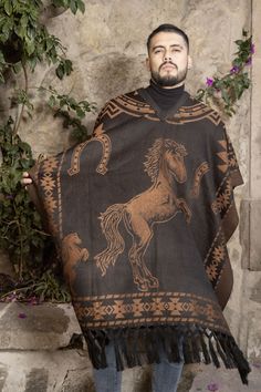 Step into the heart of Mexico's cultural heritage with our traditional men's poncho. Expertly crafted with a blend of authenticity and comfort, this poncho is a celebration of timeless craftsmanship. The earthy tones and intricate patterns reflect the rich artistic traditions of Mexican culture, offering a stylish nod to the country's vibrant history.  Embrace the spirit of Mexico with this classic piece that effortlessly merges heritage and style. Made out Acrylic, non-itchy material.  One size Traditional Brown Winter Cape, Traditional Brown Poncho For Festival, Traditional Brown Shawl Poncho, Poncho Winter, Mens Poncho, Mexican Men, Winter Shawl, Poncho Pattern, Traditional Mexican