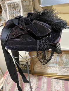 "Silk velvet hat in stunning black/ with red roses and black beadwork and black feathers plus silk net. about 8 1/2\" or so measuring inside from side to side x 7\". silk lined with wire inside to shape it. strong and wearable." Victorian Evening Hats For Kentucky Derby, Victorian Cloche Hat For Evening, Black Victorian Hat For Evening, Black Victorian Evening Hat, Vintage Black Headpiece For Kentucky Derby, Vintage Black Headpieces For Kentucky Derby, Vintage Black Mini Hat For Costume, Vintage Black Mini Hat For Costumes, Hat Silk