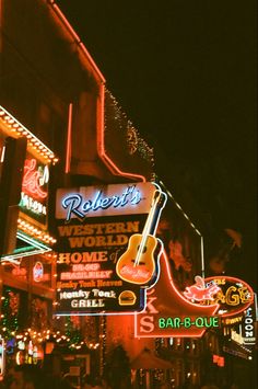 the neon signs are all lit up for us to see