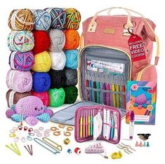 an assortment of crochet and knitting supplies including yarn, scissors, needles, markers, bags