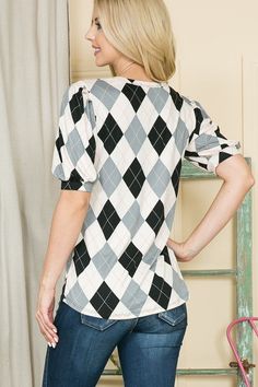 This top boasts a playful Argyle print and comfy, loose fit. The round neck and soft jersey knit make it easy to wear all day, while the pleated puff sleeves add a fun touch. Perfect for a casual day out or weekend adventures. Poly SpanMade In: USA Model is 5'8 wearing size Small Fall Printed Tops With Balloon Sleeves, Fall Tops With Printed Balloon Sleeves, Fall Tops With Balloon Sleeves And Printed Details, Trendy Printed Puff Sleeve Tops, Casual Puff Sleeve Loungewear Tops, Casual Puff Sleeve Tops For Loungewear, Casual Puff Sleeve Top With Crew Neck, Casual Cotton Top With Balloon Sleeves, Spring Puff Sleeve Tops For Loungewear