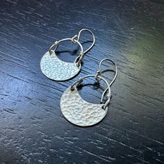 This listing is for SHINY (NO PATINA) SILVER Crescents Over the years, my Crescent earrings have become our most popular and recognizable style! They are often one of the first pair of earrings that people get for themselves or to gift another to start their collections. Regardless of which size you choose, they are all amazingly lightweight and perfect as your "every day" earrings! Hammered Sterling suspended from Sterling Silver wire and Sterling Silver earwires. Available in 4 sizes: Tiny - 3 Hammered Earrings For Everyday Wear, Hammered Drop Wrap Earrings For Gift, Hammered Drop Wrap Earrings As A Gift, Vintage Single Earring For Everyday Wear, Vintage Single Earring For Everyday, Hammered Crescent Earrings As Gift, Hammered Drop Earrings For Gifts, Hammered Earrings For Anniversary, Sterling Silver Small Hoop Pierced Earrings