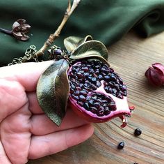 "This necklace already sold but I can make very similar (not 100% same) for your order. If you need longer chain please write it in comment to order) Statement juicy pomegranate pendant with leaves. Pomegranate seeds - natural garnet. skin and leaves - polymer clay. the bead at the top of the pendant is garnet. Garnet pomegranate ) Garnet - January birthstone Diameter of pomegranate 5cm (1.96\") Chain 48cm (19\")" Red Nature-inspired Jewelry For Gifts, Garnet Natural Stones Jewelry For Gift, Handmade Garnet Pendant Necklace, Garnet Pendant Necklace Gift, Garnet Pendant Necklace For Gifting, Garnet Pendant Necklace For Gift, Garnet Pendant Necklaces For Gift, Garnet Pomegranate, Pomegranate Pendant