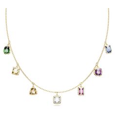 Bring droplets of bright color to your style with this eclectic Chroma necklace. Crafted with a gold-tone plated setting and lobster clasp, the design features a variety of Swarovski Zirconia cuts in seven complementary colors. For extra radiance, each stone is surrounded by smaller square crystals, resulting in a necklace that never stops shining. Match this necklace with sophisticated earrings from the same family, or gift it to a loved one. Swarovski Millenia, Sophisticated Earrings, Cute Necklaces, Jewelry Pearls, Pink Watch, Blue Watches, Swarovski Necklace, Stunning Necklace, Adjustable Necklace