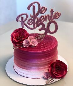 there is a cake that has been decorated with roses