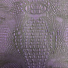 an alligator skin pattern is shown in purple