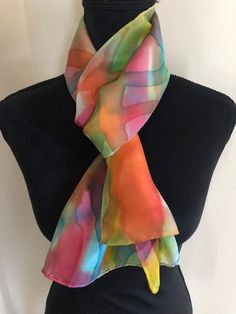 "Beautiful one of a kind handpainted silk habotai scarf.  Painted with silk dyes that are steam set so they are color fast.  Scarf is 11\" wide x 60\" long with hand rolled  hem.  Included with purchase is a gift envelope and care instructions." Multicolor Hand Painted Silk Scarves, Artsy Multicolor Silk Scarf For Artistic Expression, Multicolor Hand Painted Scarves As Gift, Artful Multicolor Scarves As Gift, Multicolor Hand Dyed Silk Scarves, Artistic Multicolor Silk Scarf For Gift, Artistic Hand-painted Multicolor Silk Scarf, Artful Hand-painted Multicolor Silk Scarf, Artful Hand Painted Multicolor Silk Scarf