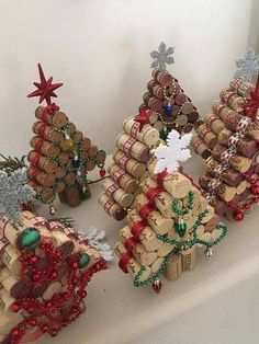 several small christmas trees made out of crackers