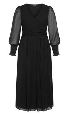 a woman wearing a black dress with sheer sleeves and pleaing on the shoulders,