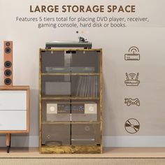 there is a large storage space next to a tv and other items on the floor