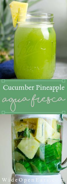 a glass jar filled with green liquid and sliced pineapples on top of it