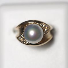 Very rare MADAMA pearl.  Extreme luster and iridescent overtones. The price was set at a bargain price due to flaws on the side of the pearl.  We especially recommend this item for those who do not mind flaws! One of a kind. First come, first served! This product is free upgrade shipping. 【The size of the ring can be resized】 ・It will take 5-10days to ship. Or it may take longer.  ・Orders cannot be canceled for resizing.  ・We do not accept returns of resized rings for any reason. Type of metal: Elegant Iridescent Rings With Accent Stones, Elegant Iridescent Rings For Formal Occasions, Formal Iridescent Rings With Accent Stones, Iridescent Rings With Accent Stones For Formal Occasions, Iridescent Rings With Accent Stones For Formal Events, Ring With Diamond, Akoya Pearls, Types Of Stones, The Pearl