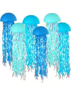 four blue jellyfish hanging from the ceiling with paper lanterns attached to it's sides