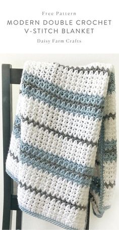 a crocheted blanket sitting on top of a chair