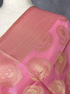 Baby Pink Color Dupatta with Gold Zari Weaved Big diya Buttas with nice borders. Gold Zari Weave. The tassels are beige in Color matching the gold Zari. Item: DupattaBase color : Baby PinkFabric : Soft Silk (Not Pure Silk)Work : Zari Weaved with tasselsLength of the Dupatta : 92 inches approx.Width of the dupatta : 35 inches (Approx.)Store Policies- No return or exchange will be accepted for color variations.- No return or exchange will be accepted if the color does not match your other clothing Pink Dupatta With Motifs For Celebration, Eid Celebration Choli With Zari Weaving, Pink Traditional Wear With Motifs For Celebration, Festive Pink Tussar Silk Choli, Pink Saree With Motifs For Celebration, Festive Pink Saree With Motifs, Bollywood Style Handloom Lehenga For Celebrations, Festival Traditional Wear With Self Design For Celebration, Pink Tussar Silk Choli With Pallu