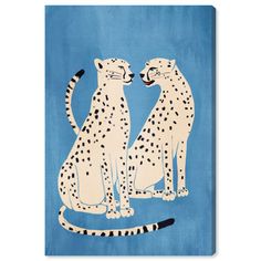 two white cheetah sitting next to each other on a blue background