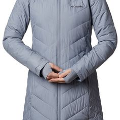 Winter nights spent skating at the rink or wandering between shops downtown call for the Columbia Women's Heavenly Long Hooded Jacket. With a cut the provides added coverage and a cozy synthetic fill that delivers water-resistant warmth, this cute and cuddly winter coat will keep you out and about through the coldest months of the year. Winter Sports Nylon Outerwear, Nylon Outerwear For Winter Sports, Insulated Long Sleeve Puffer Jacket For Winter Sports, Winter Nylon Parka With Zipper Closure, Nylon Hooded Jacket For Winter Sports In Fall, Nylon Hooded Jacket For Winter Sports, Nylon Outerwear With Double-lined Hood For Winter Sports, Long Sleeve Down Hooded Jacket For Winter Sports, Fitted Puffer Jacket With Double-lined Hood For Outdoor