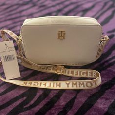 It’s A Tommy Hilfiger Bag Brand New White Shoulder Bag With Logo Strap For Everyday, Everyday White Shoulder Bag With Logo Strap, White Bags With Logo Strap For Everyday Use, White Bag With Logo Strap For Everyday Use, Elegant White Bags With Logo Strap, White Bags With Logo Strap For Shopping, Chic White Bag With Logo Strap, White Bag With Logo Strap For Shopping, White Tommy Hilfiger Bag For Everyday