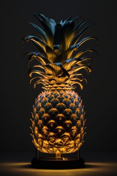 a lit up pineapple sitting on top of a table