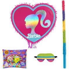 a pink heart shaped balloon, sunglasses and candy bag with the word barbie on it