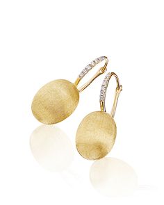 Elegant yellow gold and diamond earrings. The golden and uneven surface, entirely hand-engraved by our artisans with a special burin tool, creates together with diamonds a prodigious game of lights to be combined with a both elegant and casual look.Earring size: 11,50 mm x 27,50 mmDIAMONDS: - Weight (total): 0.10 CT - Clarity: VS - Color: G - Cut: round 18kt Gold Jewelry, Gold And Diamond Earrings, Ball Drop Earrings, Ball Drop, Contemporary Luxury, Ring Watch, Yellow Gold Earring, Small Earrings, Everyday Jewelry