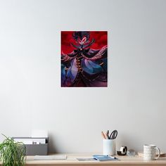 an abstract painting of a demon on a white wall above a desk with a plant