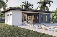 an artist's rendering of a small house with lounges and palm trees in the background