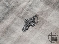 "On the front side of the 925 silver greek orthodox cross there is an image of the crucifix of Jesus Christ surrounded by saints. At the bottom of the cross necklace is the inscription \"NIKA\". On the reverse of the cross is the inscription \"Save and Preserve 2000 years\" (2000 years from the date of the Christianization of Rus). Christogram (chrismon) is depicted in a small circle under the inscription. It is a chi rho - monogram of Christ consisting of 2 Greek letters X and P. The letters of Spiritual Hallmarked Crucifix Jewelry And Charms, Symbolic Engraved Crucifix Jewelry, Silver Symbolic Crucifix Jewelry And Charms, Spiritual Engraved Cross Pendant Jewelry, Spiritual Silver Crucifix Jewelry And Charms, Engraved Spiritual Cross Pendant Jewelry, Silver Spiritual Crucifix Jewelry And Charms, Engraved Spiritual Cross Jewelry And Charms, Engraved Spiritual Cross Charms And Jewelry