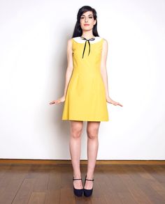 "MADISON DRESS Handmade dress 35%Cotton 65%Polyester Colors: yellow, white, black bow You can choose another color if you want. Each color has a number, just choose your favourite! You can see here a close up of the fabrics I use https://www.etsy.com/listing/211718422/how-the-fabric-i-use-looks-like-close-up?ref=shop_home_active_5 This dress is also available custom made! We need to know: Chest, waist, hips, upper arm circumference, length Sizes XS: CHEST 84 CM / WAIST 66 CM / HIPS 90 CM S: CHES Dress Peter Pan Collar, Pan Collar Dress, 1960s Dress, Peter Pan Collar Dress, 1960's Dress, Simply Lovely, Dress Cotton, White Bow, Short Wedding Dress