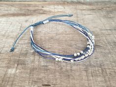 "This unisex bracelet or anklet made with navy blue, royal blue and white waxed cord, 3mm silver plated beads and sliding knot for closure. *Size: Choose your size or meterial from the drop-down menu. **If you need other colors waxed cord, just take note to me in the \"message to seller\" *✈️ Shipping.. The item shipped by Registered Airmail Thailand Post within 3-5 working days after payment received. - United States and Europe: It will take about 2-4 weeks to delivery after shipping. -Asia : I Adjustable Blue Beaded Bracelet With Waxed Cord, Blue Adjustable Friendship Bracelets With Round Beads, Blue Waxed Cord Friendship Bracelets With Sliding Knot, Blue Adjustable Waxed Cord Bracelets, Blue Adjustable Cord Bracelet In Waxed Cord, Adjustable Blue Waxed Cord Friendship Bracelets, Adjustable Blue Waxed Cord Bracelets, Blue Bracelets With Adjustable Waxed Cord, Blue Waxed Cord Bracelet With Sliding Knot