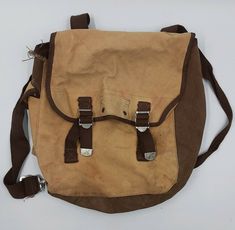 Classic Old-School Canvas Knapsack Rucksack Small Vintage Backpack Style Pack, Used/Preowned Vintage, With Some Damage, Fraying and Wear (See pics).  12"x11", 5" Thick. Vintage School Backpack, Vintage Backpack For Everyday Use, Vintage Travel Backpack, Vintage Satchel Backpack For Daily Use, Vintage Beige Satchel For School, Vintage Satchel School Backpack, Vintage Satchel Backpack With Adjustable Strap, Vintage Satchel For School, Vintage School Satchel With Adjustable Strap