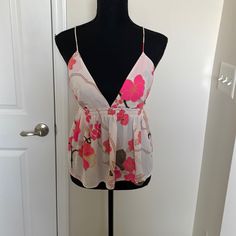 Super Cute Express Top. Flattering Peplum Style With A Sexy Plunging Front. The Tie In The Back Will Accommodate For Varying Bust Sizes. Light And Airy Material. Size Small Spaghetti Strap Top, Peplum Styles, Strap Top, Strap Tops, Pink White, Spaghetti Strap, Spaghetti, Super Cute, Womens Tops