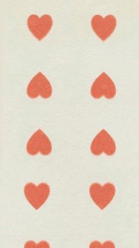 red hearts are arranged in the shape of four on a white paper sheet with orange ink