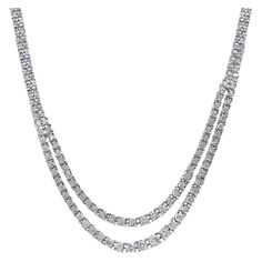 This item is made to order. Carat weights, gold weights, and measurements are subject to a slight variance.  Platinum set 254 piece Round cut 10 Carat total natural diamond - 39 grams - two strand classic graduated diamond riviera tennis necklace with box and safety latch closure. 4 prong setting. A unique twist to the classic tennis necklace. Made with a durable platinum 850 setting, it offers 2 strands that descend in the middle. While you may see a single or double-strand tennis necklace on the necks of others, this is a superior piece that no one else has. The making of a necklace that perfectly sits the bottom and top strands is extremely difficult to achieve with this level of smoothness and elegance. Jewelry Details: - Item Type: Riviera Graduated Tennis Necklace - Metal Type: Plati Diamond Box, Saltwater Pearls, Unisex Necklace, Tennis Necklace, Modern Necklaces, Tennis Bracelet Diamond, Modern Pendant, Multi Strand Necklace, Metal Necklaces