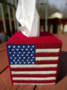 an american flag tissue box on a wooden table