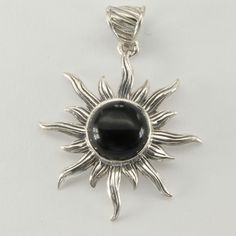 This is a beautiful Black Onyx Pendant in 925 Sterling Silver. The metal is solid silver without any nickel or other substances causing most allergies making the jewelry hypo allergenic. Size of the Pendant (incl. Bail) 3.7 x 2.8 cm 1.46 x 1.10 inch You will receive the item in a gift box - perfect to surprise someone or yourself. Usually we ship on the same day we receive the payment for the order. We want you to be happy with your purchase. If you do not like what you bough can send it back an Black Onyx Pendant, Artisan Jewelry Necklaces, Onyx Pendant, Sun Pendant, Happy Customer, Handcrafted Artisan Jewelry, Fine Jewellery Necklace, Solid 925 Sterling Silver, Artisan Jewelry