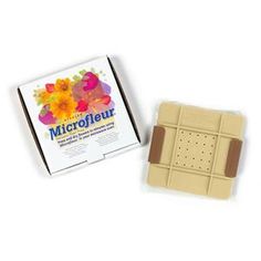 a box of microflour chocolate next to a piece of cake