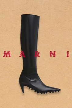 The Knee-High Spike Boot in nappa leather.

Marni Fall/Winter 24 Vol.2 is available on marni.com and in stores. Nappa Leather, Italian Fashion, Leather Boots, Knee High