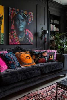 a living room filled with furniture and paintings on the wall