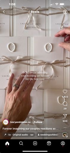 two hands touching each other's fingers in front of a wall with rings on it