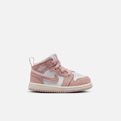 Style No. FN7537-161 Color: White/Legend Pink/Sail Tickle 'em pink with this special edition of the shoe that started it all. These mini J's have a rosy colorway and classic Jordan construction that's built to last. Jordan 1 Mid SE Baby/Toddler Shoes. Nike Mid Pink, Pink Jordans, Baby Jordans, Air Jordan 1 Mid Se, Nike Air Jordan 1 Mid, Toddler Socks, Kids Jordans, Synthetic Materials, Air Jordan 1 Mid