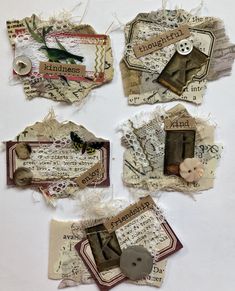 four pieces of altered paper with buttons and thread